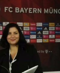 Luciana Scrofani Green Italian interpreting for FC Bayern Munchen