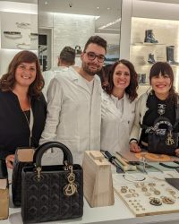 Luciana at the Manchester Dior store alongside three Dior staff